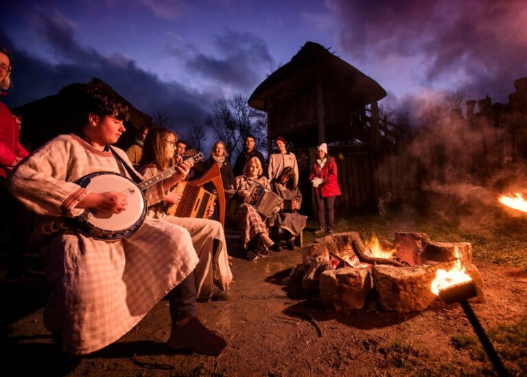 playing music around a campfire national heritage center co wexford web size